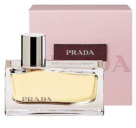 prada amber for her.